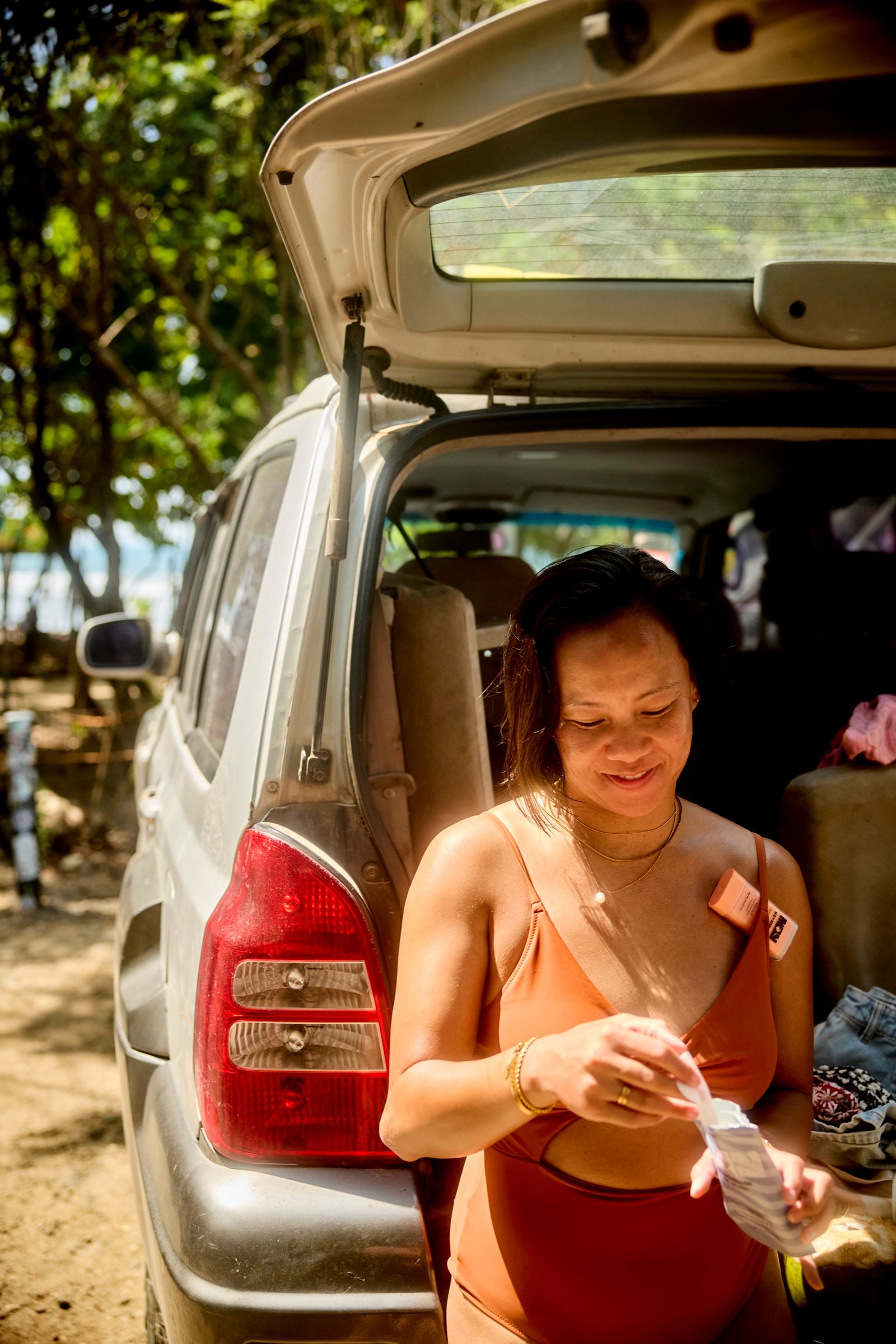 Moment of Youth: Applying the stick by the car